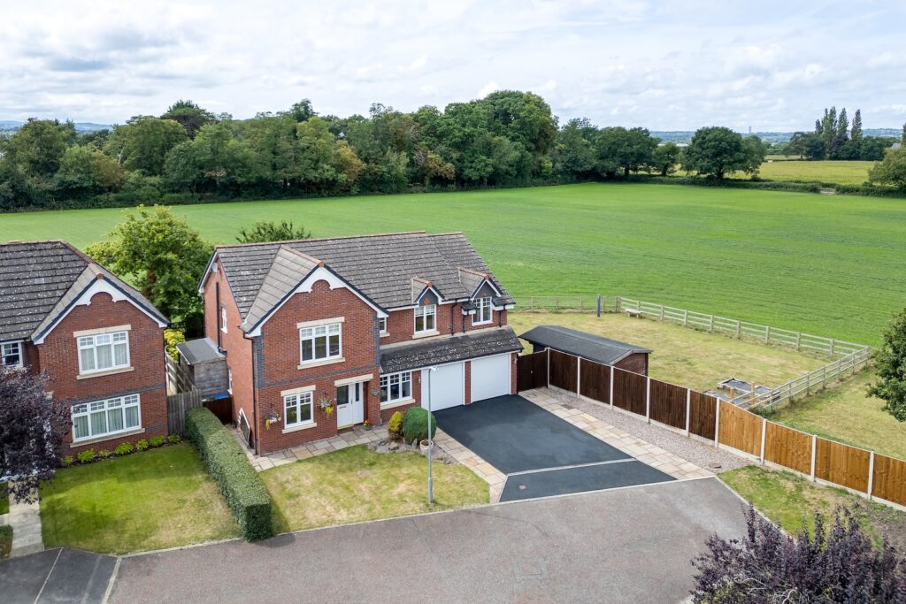 An impressive five bedroom detached family home with views over open farmland